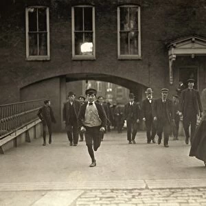 HINE: CHILD LABOR, 1909. Textile workers exiting the Amoskeag Mfg. Co. in Manchester