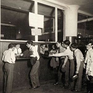 HINE: CHILD LABOR, 1910. Messenger boys turning in their uniforms at the main office