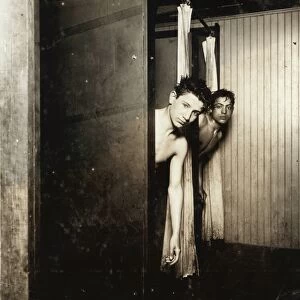 HINE: CHILD LABOR, 1910. Two young messenger boys using the showers at the Postal Telegraph Co