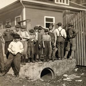 HINE: CHILD LABOR, 1913. Group of young textile workers in front of Merrimack Mill in Huntsville