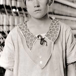 HINE: CHILD LABOR, 1924. A young worker at the Cheney Silk Mills in South Manchester, Connecticut