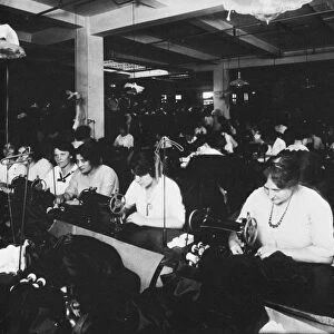 HINE: CLOTHING FACTORY, NY. Women workers at a garment factory in New York