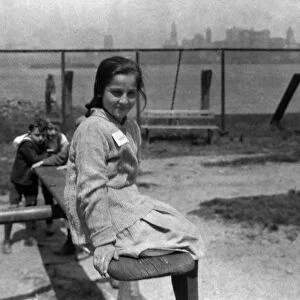 HINE: ELLIS ISLAND, c1915. Immigrant children playing on a playground at Ellis Island