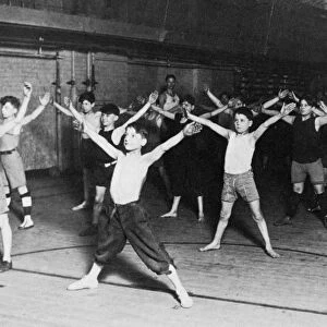 HULL HOUSE: GYMNASIUM. Boys in a gymnasium class at Hull House, Chicago, Illinois