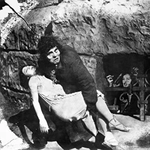 HUNCHBACK OF NOTRE DAME. Silent film still. Lon Chaney in the title role of The Hunchback of Notre Dame, 1923