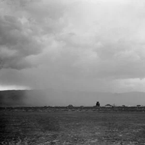 IDAHO: DUST STORM, 1936. A dust storm over Holbrook, Idaho. Photograph by Arthur Rothstein