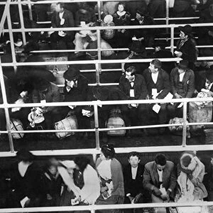 IMMIGRANTS: ELLIS ISLAND. Immigrants in the reception hall at Ellis Island, New York