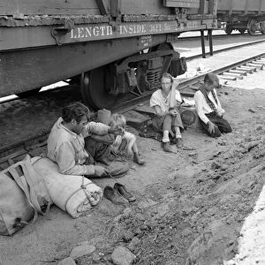 ITINERANT FAMILY, 1939. An itinerant family who travels by freight train in Toppenish, Washington