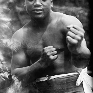 JACK JOHNSON (1878-1946). American heavyweight pugilist. Photographed c1910-1915