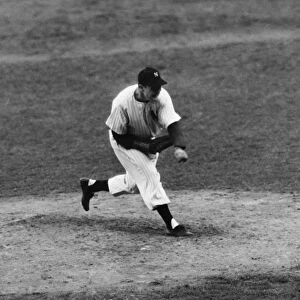 JOE PAGE (1917-1980). American baseball pitcher. Pitching the New York Yankees to victory over the Brooklyn Dodgers in the ninth inning of the seventh and deciding game of the 1947 World Series, at Yankee Stadium in the Bronx, New York City, 6 October 1947
