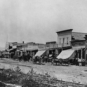 KANSAS: DODGE CITY, 1878. Front Street in Dodge City, Kansas. Photograph, 1878