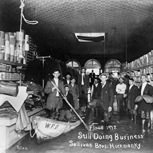 KENTUCKY: FLOOD, 1912. People inside the Sullivan Brothers store in Hickman, Kentucky