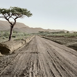 KENYA: HIGHWAY, 1936. A muddy highway in the Rift Valley en route to Nairobi in Kenya