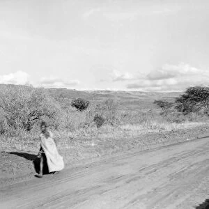 KENYA: HIGHWAY, 1936. Scene along a highway in the Rift Valley in Kenya