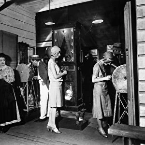 KINETOSCOPE, 1920s. A 1890s Kinetoscope on exhibit in the 1920s