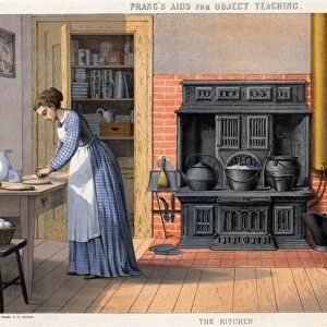 KITCHEN, c1874. A woman working in a kitchen. Lithograph, c1874