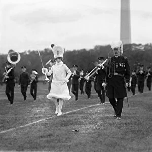 KNIGHTS TEMPLAR: FIELD DAY. Majorette Ethel Brown leads the Knights Templar marching