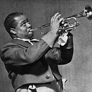 LOUIS ARMSTRONG (1900-1971). American jazz musician. Photograph, c1945