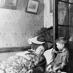 LOWER EAST SIDE, c1890. A tenement mother and child. Photograph by Jacob Riis, c1890