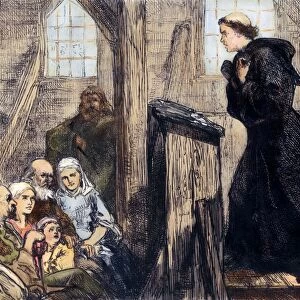 MARTIN LUTHER (1483-1546). German religious reformer. Luther preaching in the old wooden church at Wittenberg. Wood engraving, 19th century