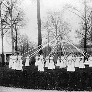 MAYPOLE DANCE, c1907. Women at the National Park Seminary dancing around the Maypole