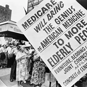 MEDICARE RALLY, 1965. A group of retired men and women with pro-Medicare signs