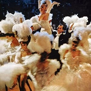 MIAMI BEACH: SHOWGIRLS, 1959. Showgirls in a performance inspired by the Ziegfeld