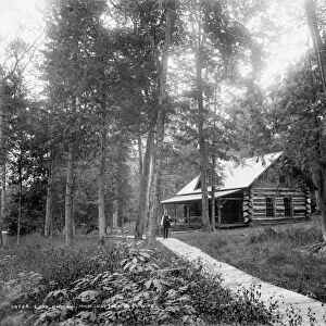 MICHIGAN: LOG CABIN. A log cabin in Lake Gogebic, Michigan. Photograph, c1880-1899