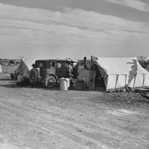 MIGRANT CAMP, 1937. Forty families of migrant farmers from the dust bowl, camped