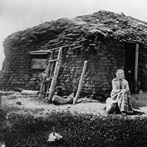 MINNESOTA: SOD HOUSE, c1896. Mrs. Beret Hagebak in front of her sod house in Lac qui Parle County