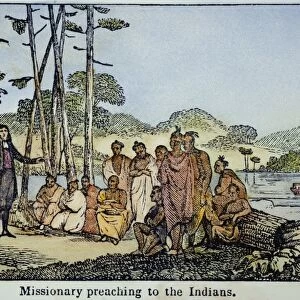 MISSIONARY AND NATIVE AMERICANS. A missionary preaching to Native Americans in the Oregon Territory. Wood engraving from an American textbook of the 1850s