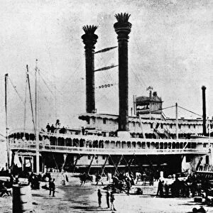 MISSISSIPPI STEAMBOAT, c1870. The steamboat Robert E. Lee docked along the Mississippi River