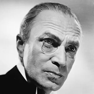 MONOCLE, 1940s. Publicity photograph, probably of the German actor Conrad Veidt wearing a monocle, c1940s