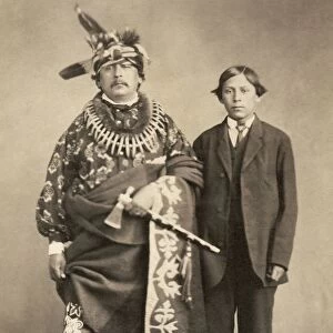 MOSES KEOKUK (1821-1908). Sac and Fox Nation chief. With his son Charles, c1868
