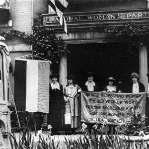 NATIONAL WOMENs PARTY. Alice Paul with officers of the National Womens Party, holding a banner with a quote by Susan B. Anthony in front of their Washington, D. C. headquarters, 1920s. Pictured are Sue White, Mrs. Benigna Green Kalb, Mrs. James Rector, Mary Dubrow and Elizabeth Kalb
