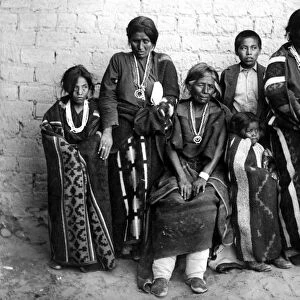 NAVAJO FAMILY, c1901. The family of Manuelito, a Navajo chief. Seated in the center is his wife