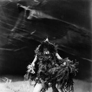 NAVAJO RITUAL, c1905. Navajo man dressed in hemlock boughs and mask associated with
