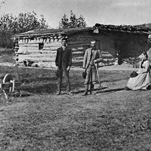 NEBRASKA: SETTLERS, 1886. The Bathrick family in front of their log house in New Helena