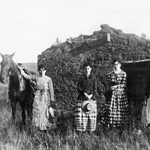 NEBRASKA: SETTLERS, 1886. The Chrisman Sisters in front of a sod house in Goheen Valley