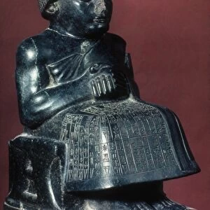 NEO-SUMERIAN PRINCE GUDEA. Diorite statuette of Gudea, Prince of Lagash, c2150 B. C