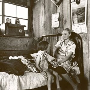 NEW MEXICO: HOME, 1940. Mrs. Caudill and her daughter in their dugout in Pie Town, New Mexico