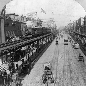 NEW YORK: THE BOWERY. View of street showing an elevated railroad in The Bowery, New York