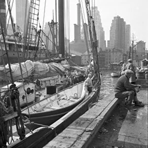 NEW YORK: BROOKLYN, 1934. A pier in Brooklyn, New York, with a view of Manhattan