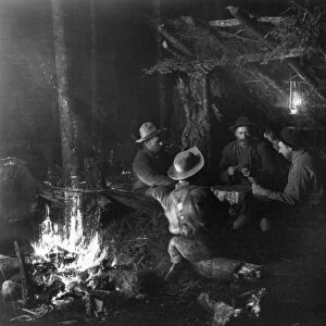 NEW YORK: CAMPING, c1888. Group of men playing cards while camping in the Adirondack Mountains