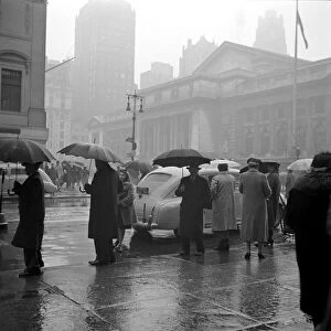 NEW YORK CITY, 1943. 42nd Street and 5th Avenue on a rainy day in New York City