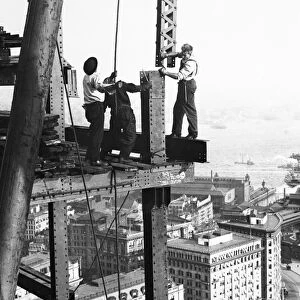 NEW YORK CITY, c1920. Construction workers atop a skyscraper in New York City. Photograph