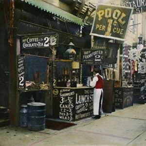NEW YORK CITY RESTAURANT. A restaurant on the Bowery, New York City, c1905. Oil over a photograph