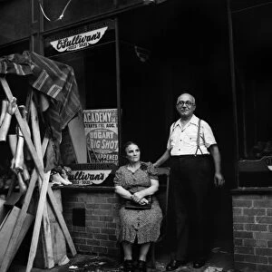 NEW YORK: LITTLE ITALY. An Italian shoemaker and his wife on Mott Street in Little Italy
