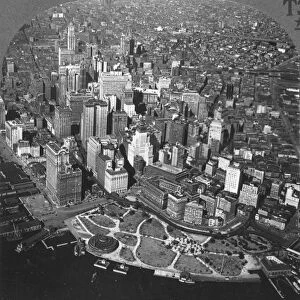 NEW YORK SKYLINE, c1920. An aerial view of lower Manhattan showing the Woolworth Building and the Aquarium, c1920: from a stereograph view