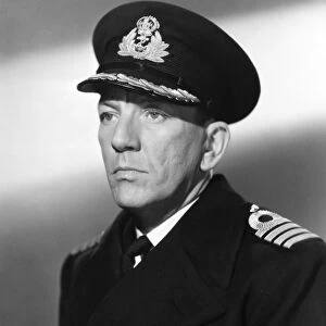 NOEL COWARD (1899-1973). English actor and playwright. Coward as the naval captain in In Which We Serve, 1941